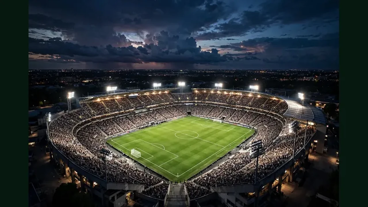 A football stadium at night under bright floodlights with a vivid green pitch